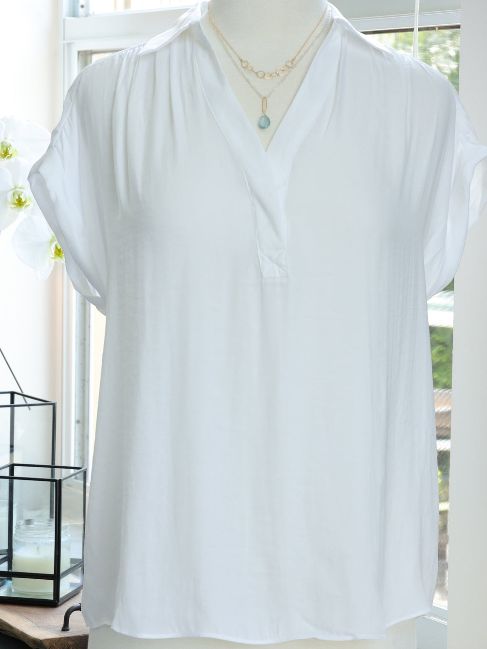 Taytum collared top with vneck. hidden 1 button closer 