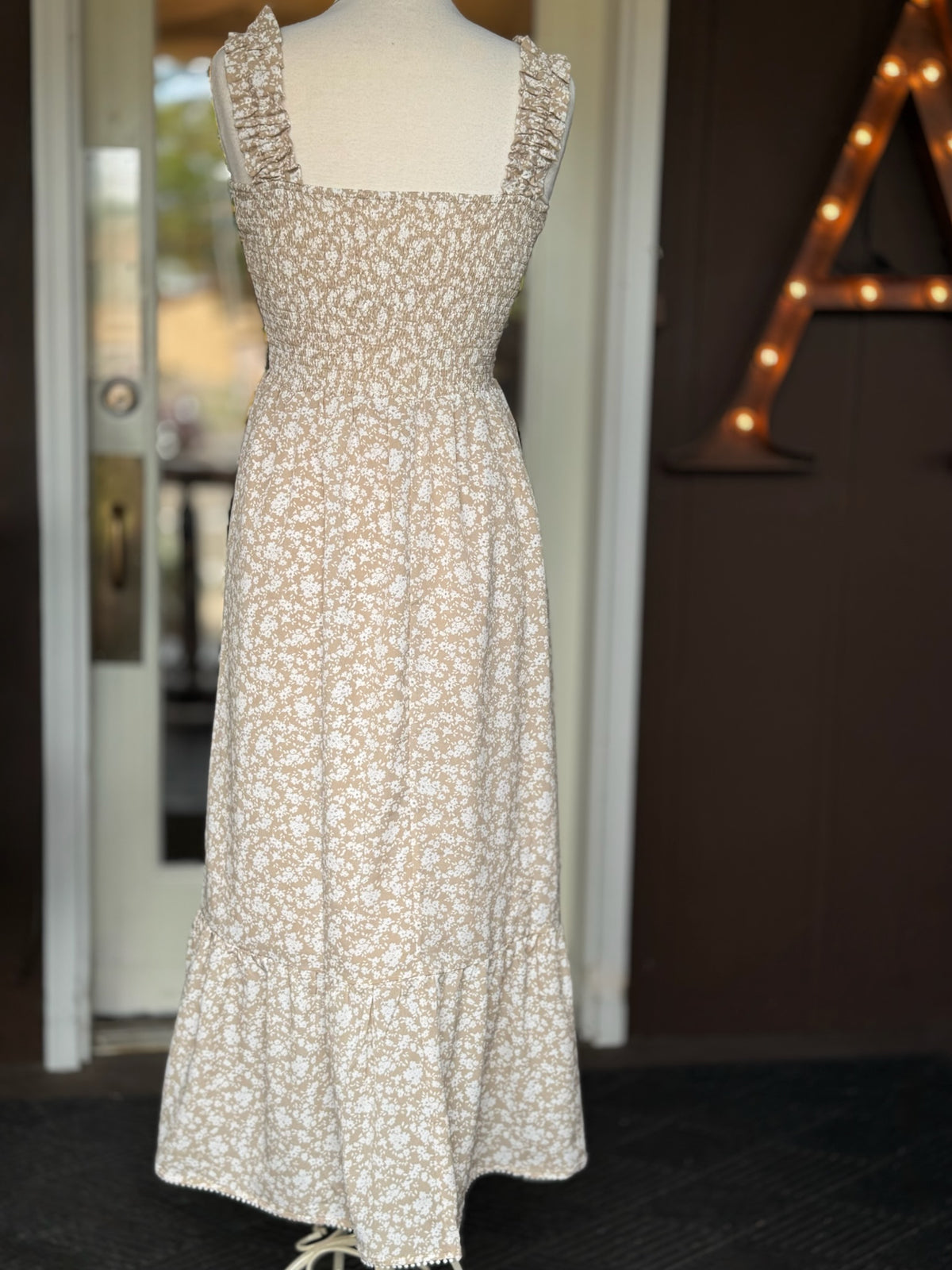 Beige floral maxi dress with a smocked bodice, square neckline, ruffle straps and a flowing skirt at Ardor Boutique.