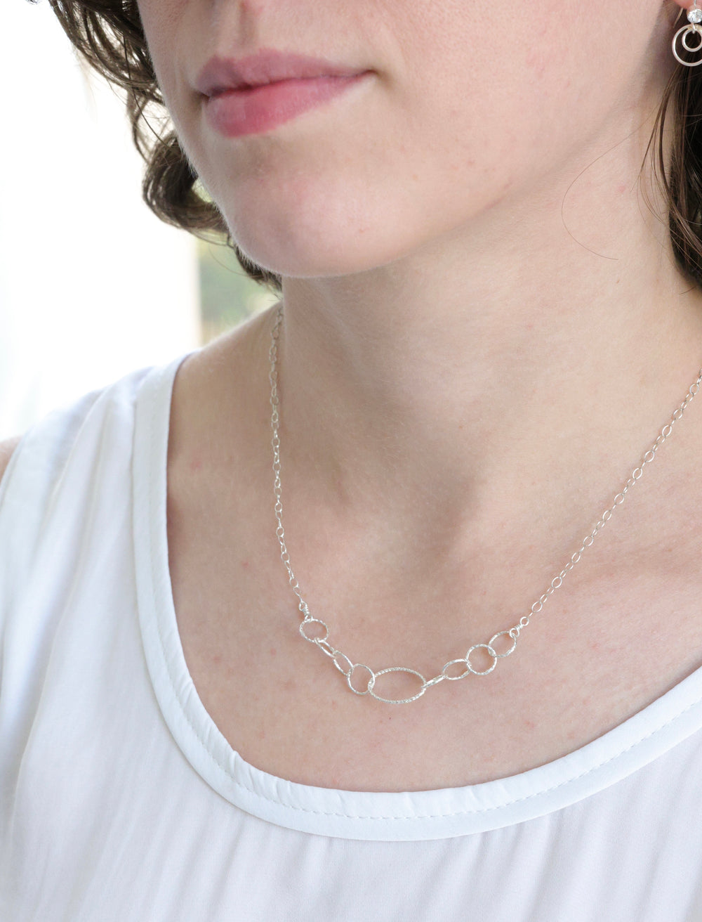 Silver necklace shown on