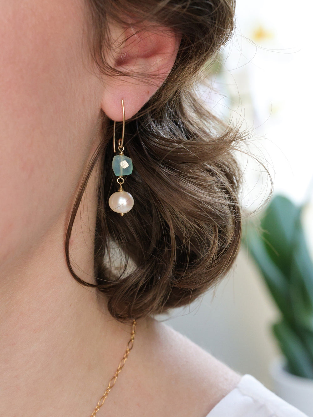 Earrings shown on model