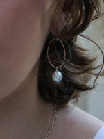 Grey pearls on a woman