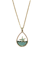 Necklace with a pendant featuring a starfish design on a white background