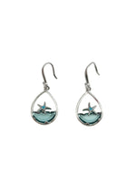 Teardrop-shaped earrings with starfish design on a white background