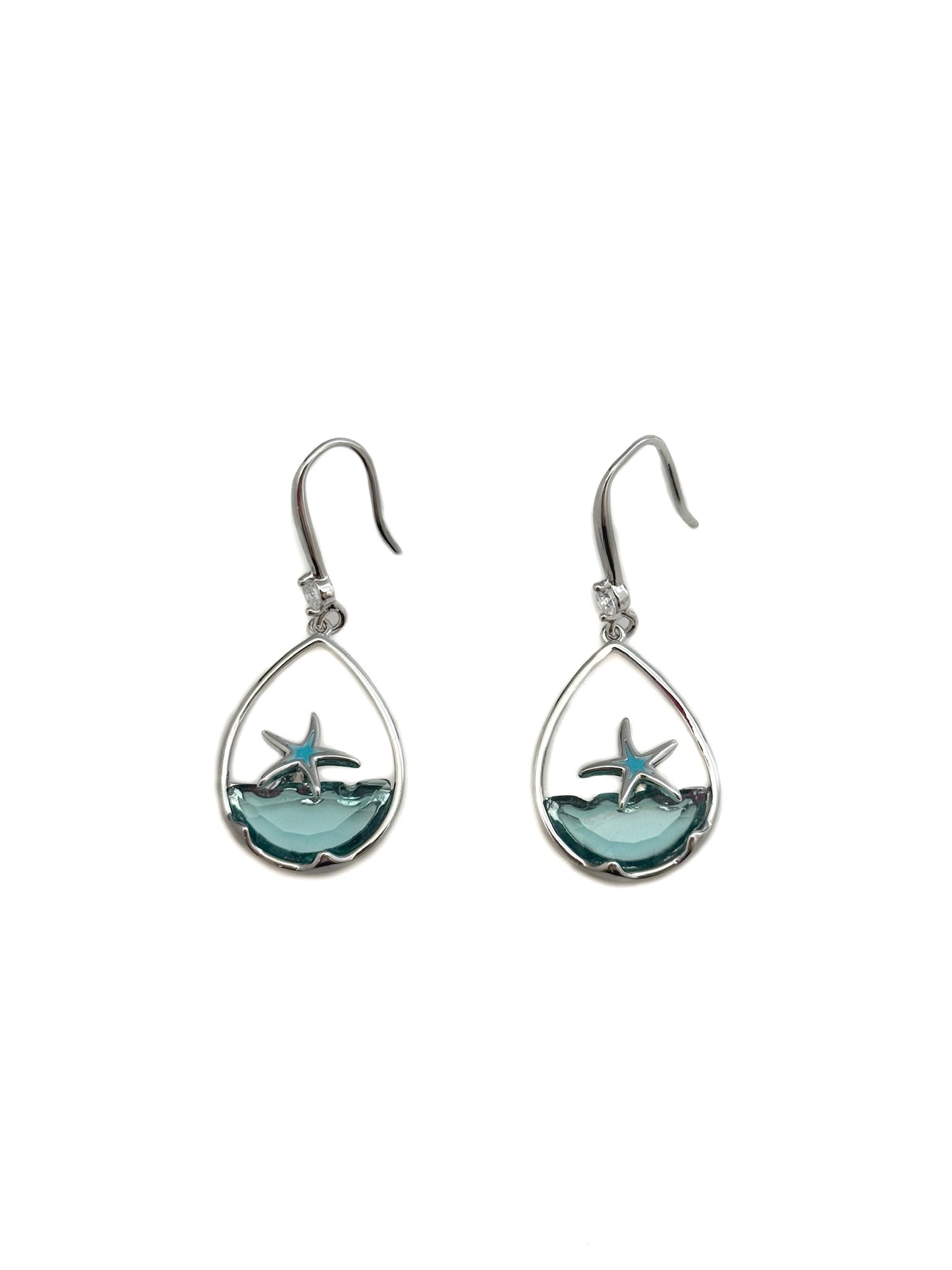 Teardrop-shaped earrings with starfish design on a white background
