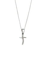 Silver cross pendant necklace on a white background