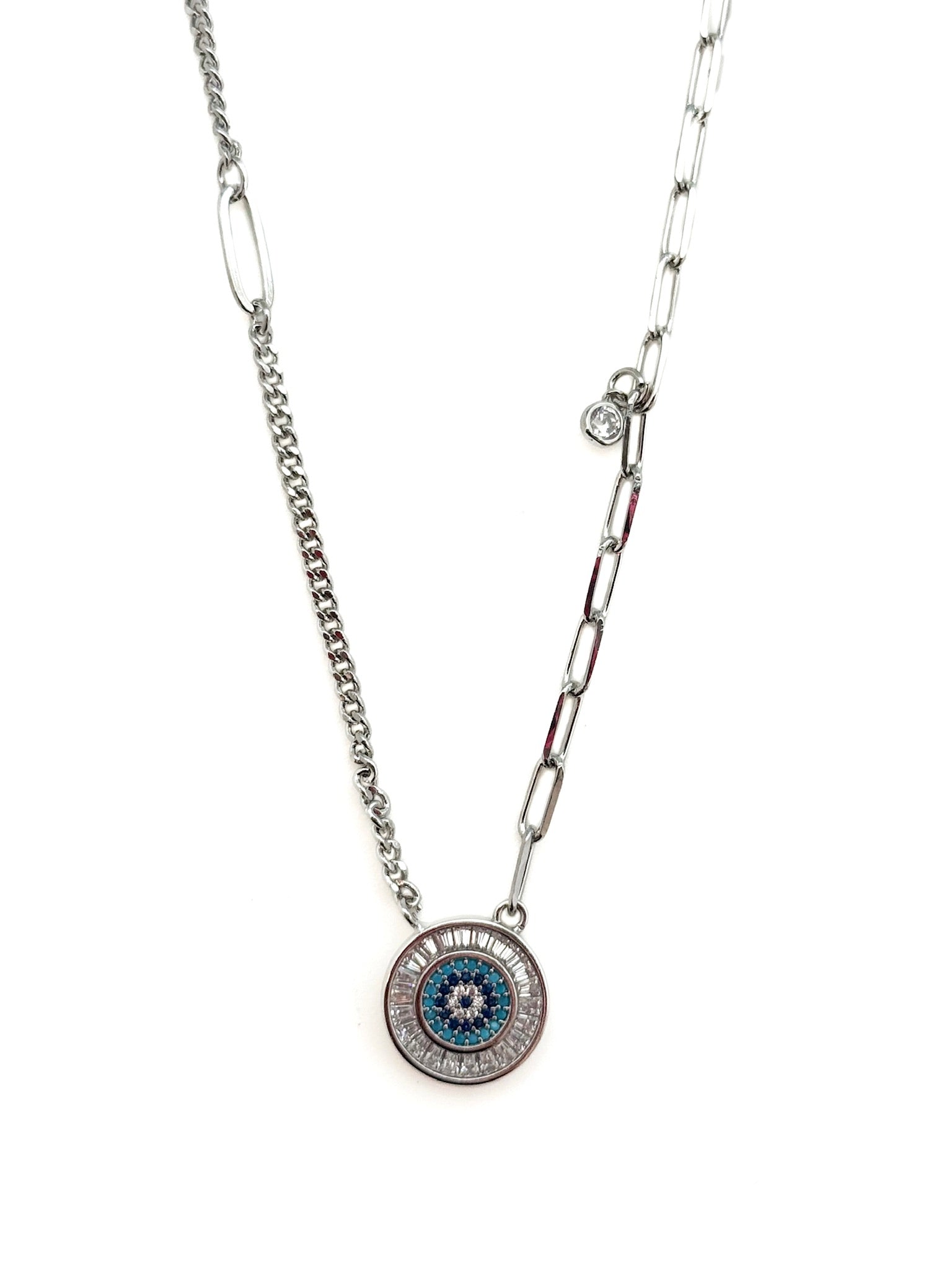Necklace with a circular pendant featuring an eye design on a white background