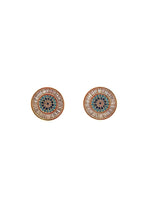 Pair of round earrings with intricate designs on a white background