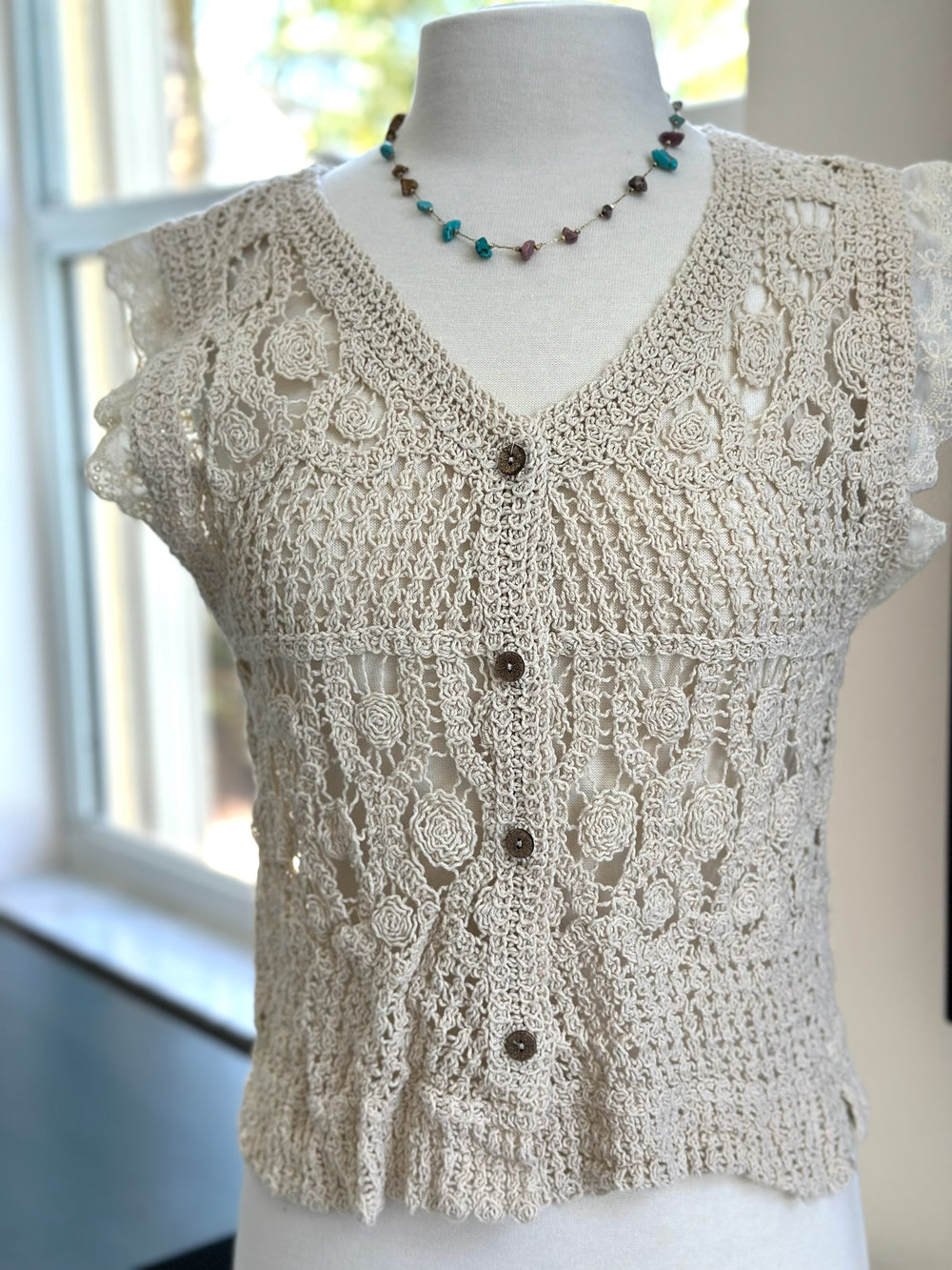 front of beige cami styled on mannequin 