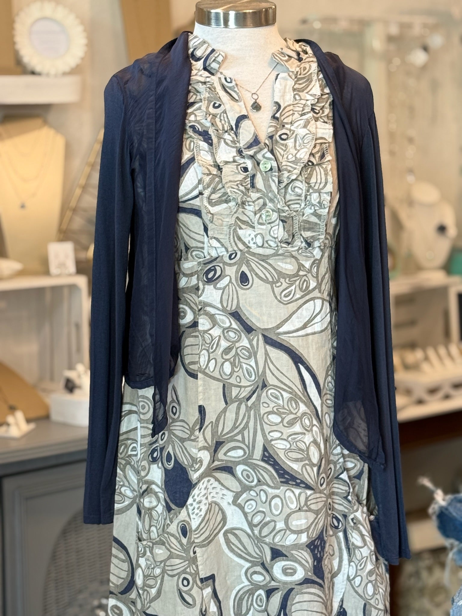 navy cardigan shown on dress
