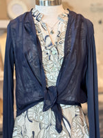 navy cardigan shown on dress