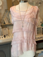 pink symmetrical ruffle top