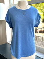 Trina top styled on mannequin with rowan necklace 