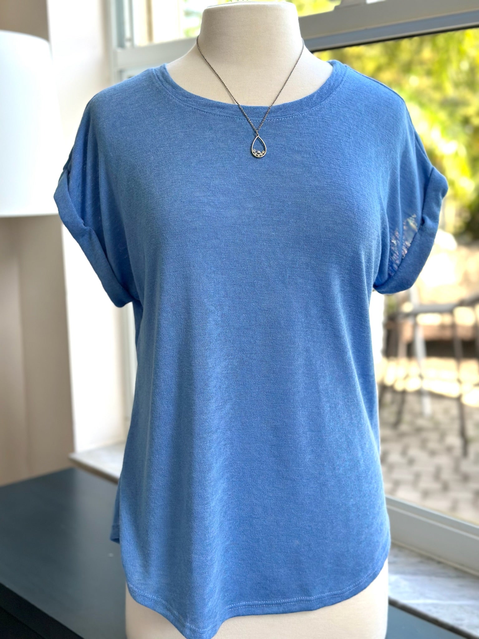 Trina top styled on mannequin with rowan necklace 