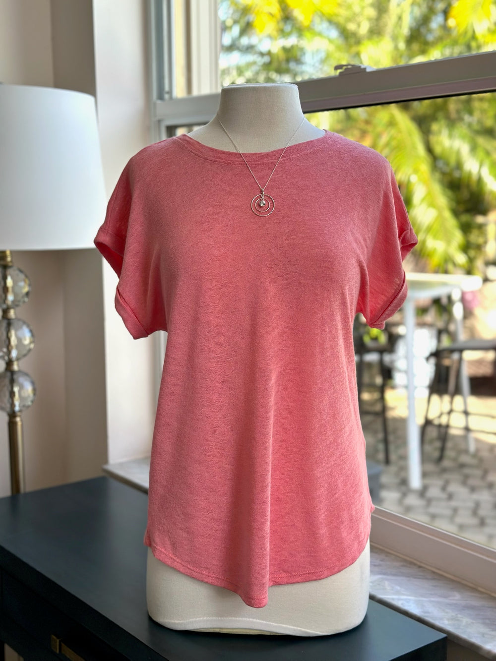 Trina top in coral styled on mannequin 