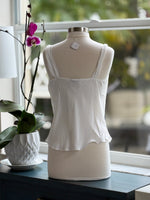 back of white cowl neck top