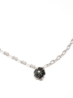 Close-up of a silver necklace with a five-petal flower pendant and dual-link chain – Five Fold Bloom Necklace in antiqued silver
