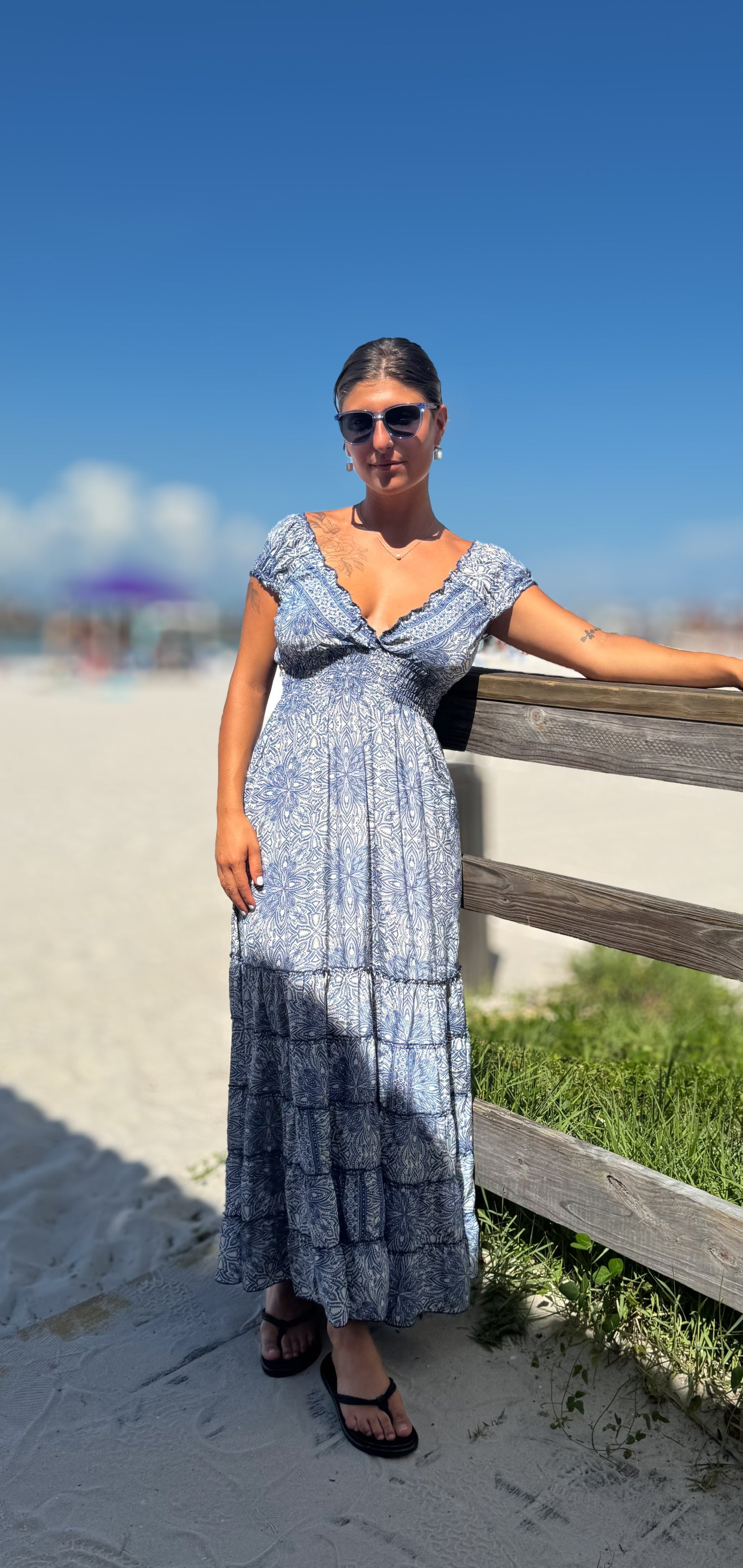 Model wearing Tucson dress in blue ivory