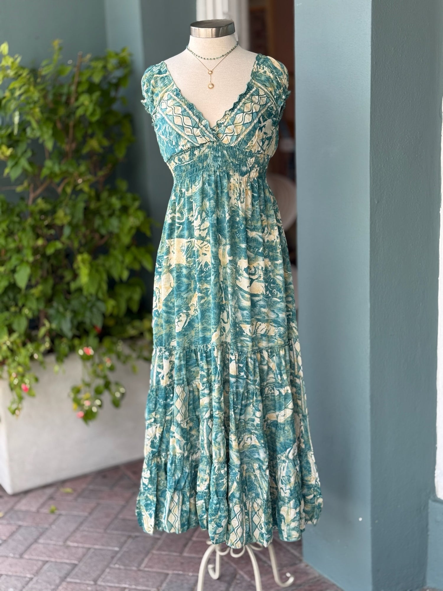 women's dress in green and gold