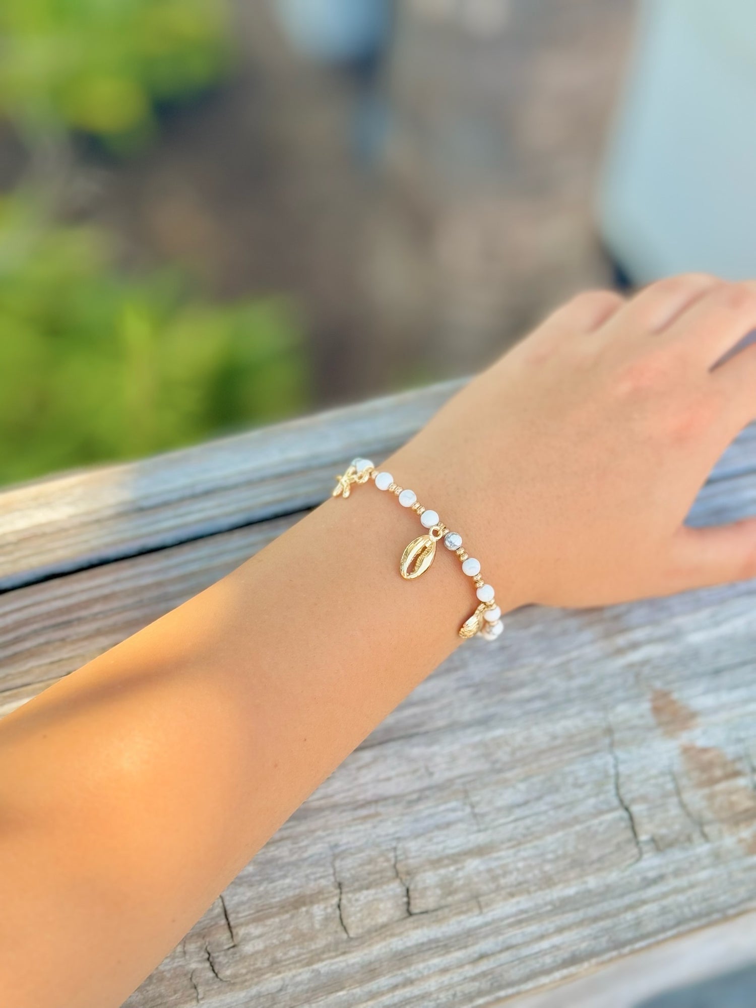 Serina white beaded charm bracelet