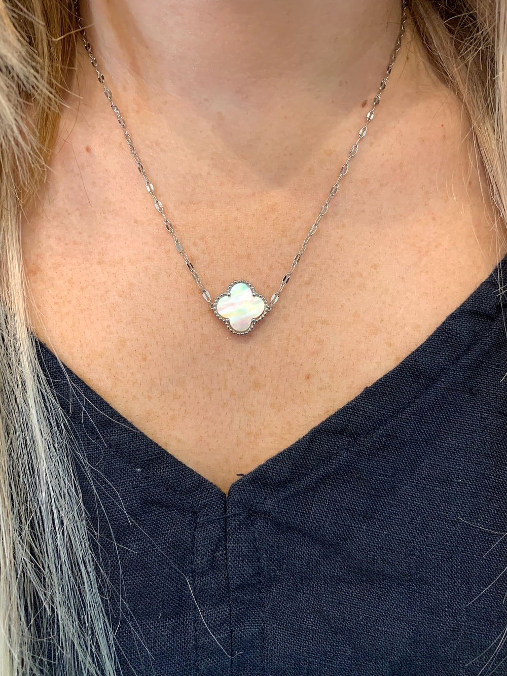 Avery necklace silver on model. 