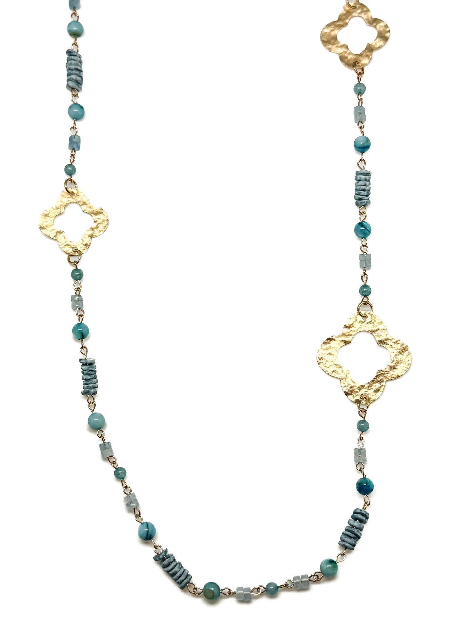 Necklace with gold and blue beads on a white background