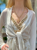 Gold necklace with a cross pendant 