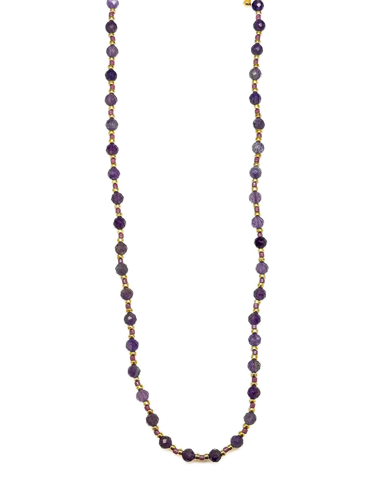Necklace with purple beads on a white background