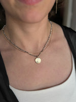 Selene Mixed chain gold necklace featuring a round hammered pendant
