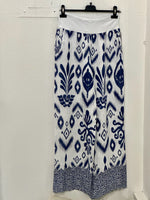 Brynn Italian linen wide-leg pants in navy and white geometric print with elastic pull-on waistband and border hem detail.