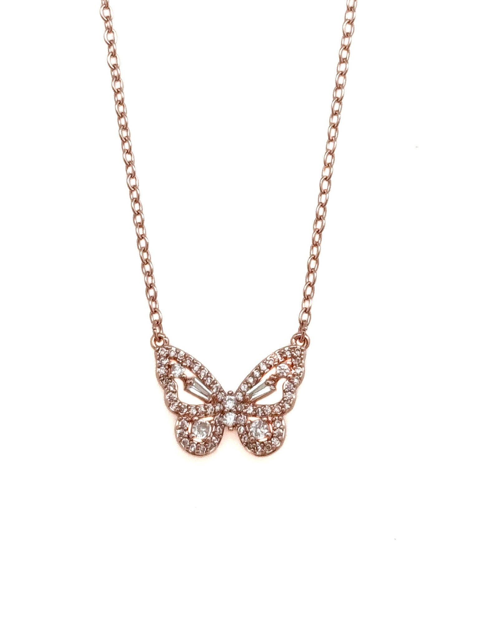 Rose gold butterfly necklace on a white background
