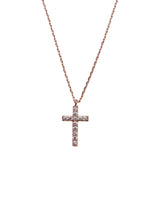 Rose gold cross necklace on a white background