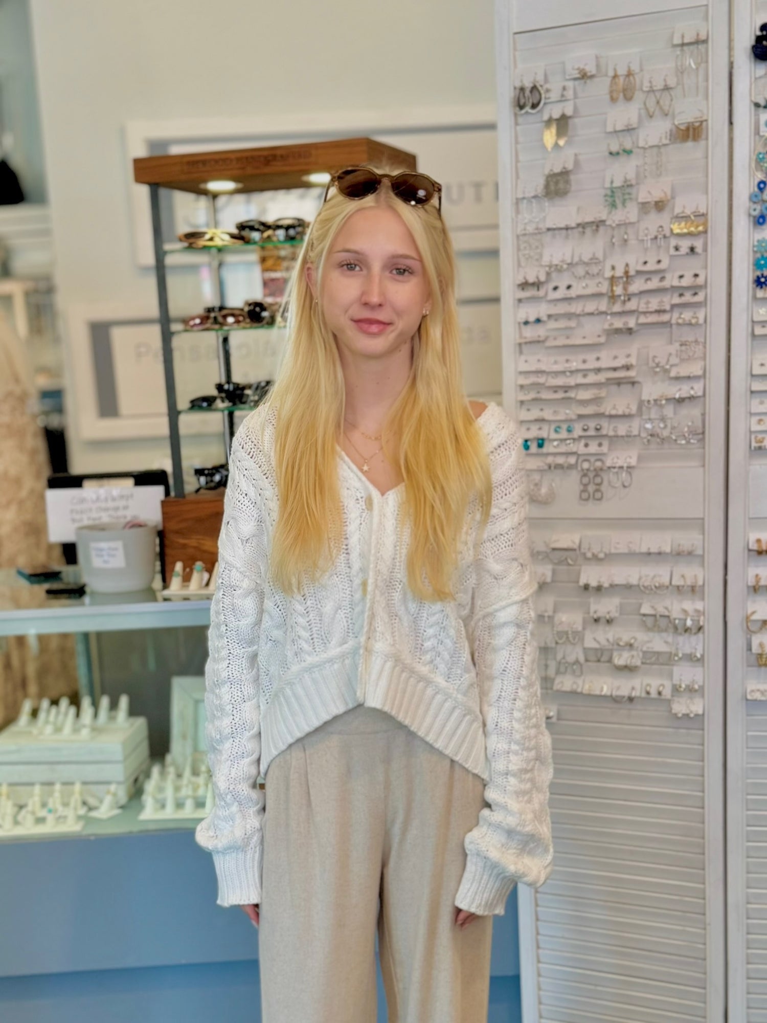 White knitted cable cardigan with cream buttons 