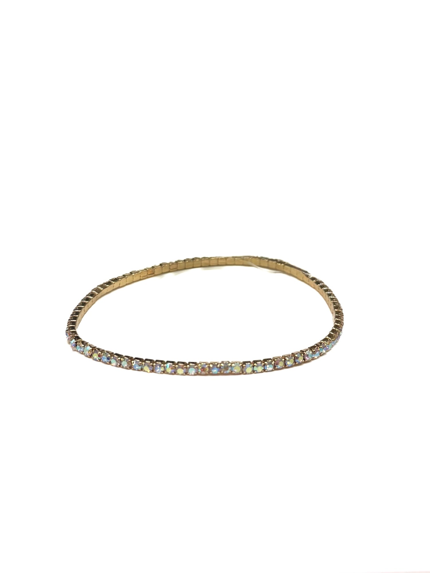 Gold bracelet with small stones on a white background
