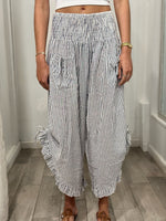 front view of woman wearing pants 