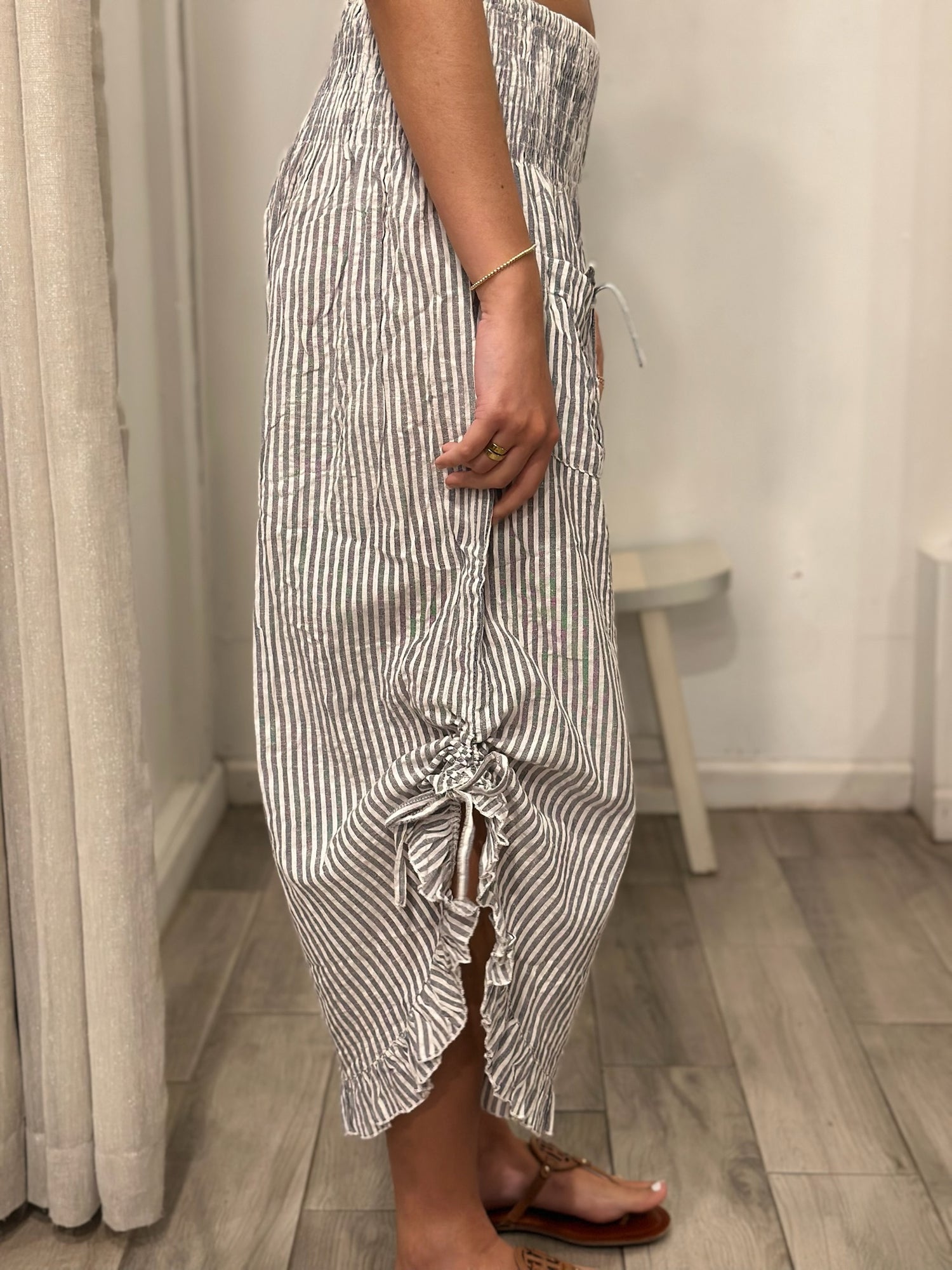 side view of woman wearing pants