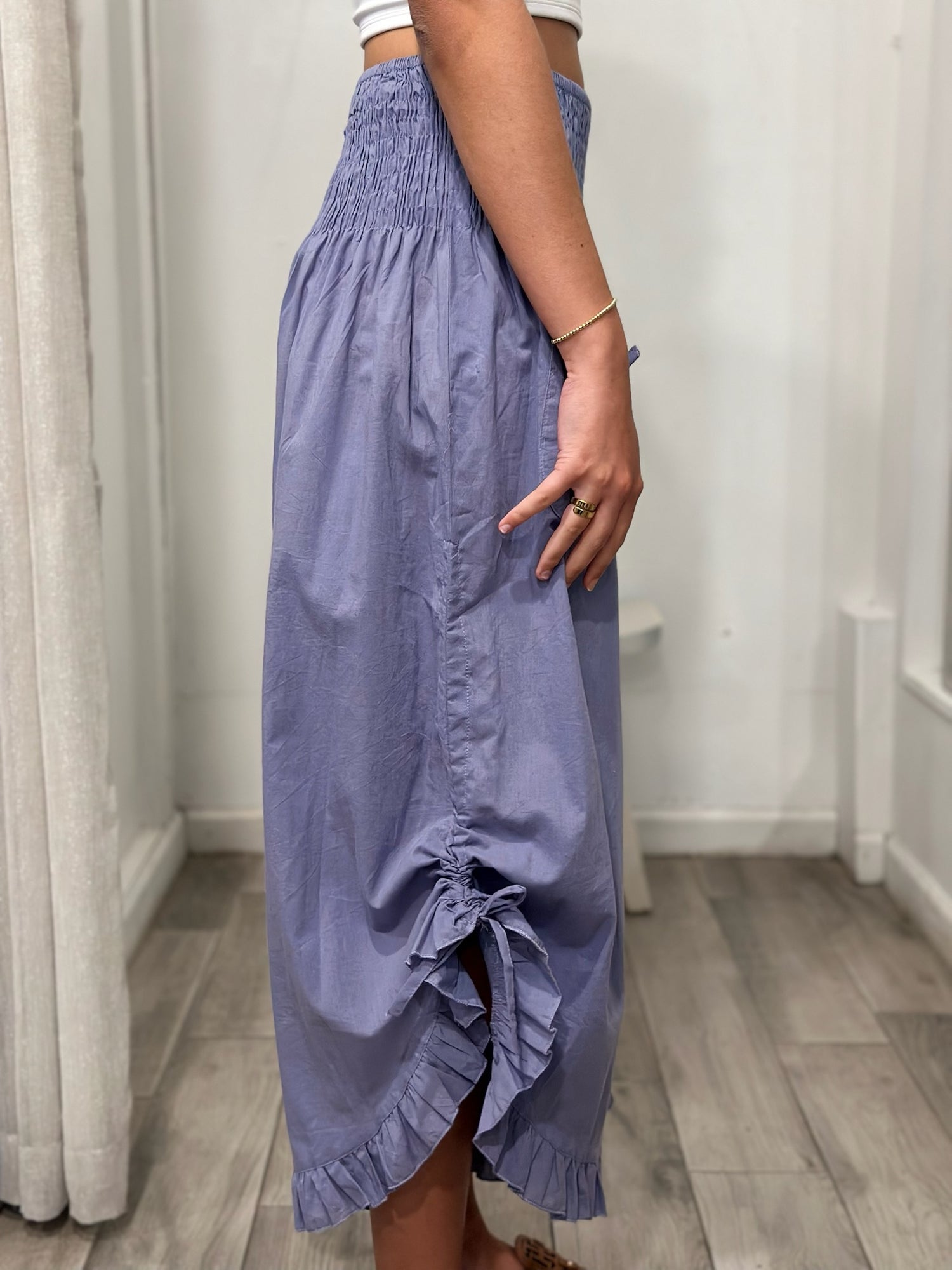 side view of woman wearing pants