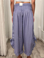 back view of  woman wearing one size pants