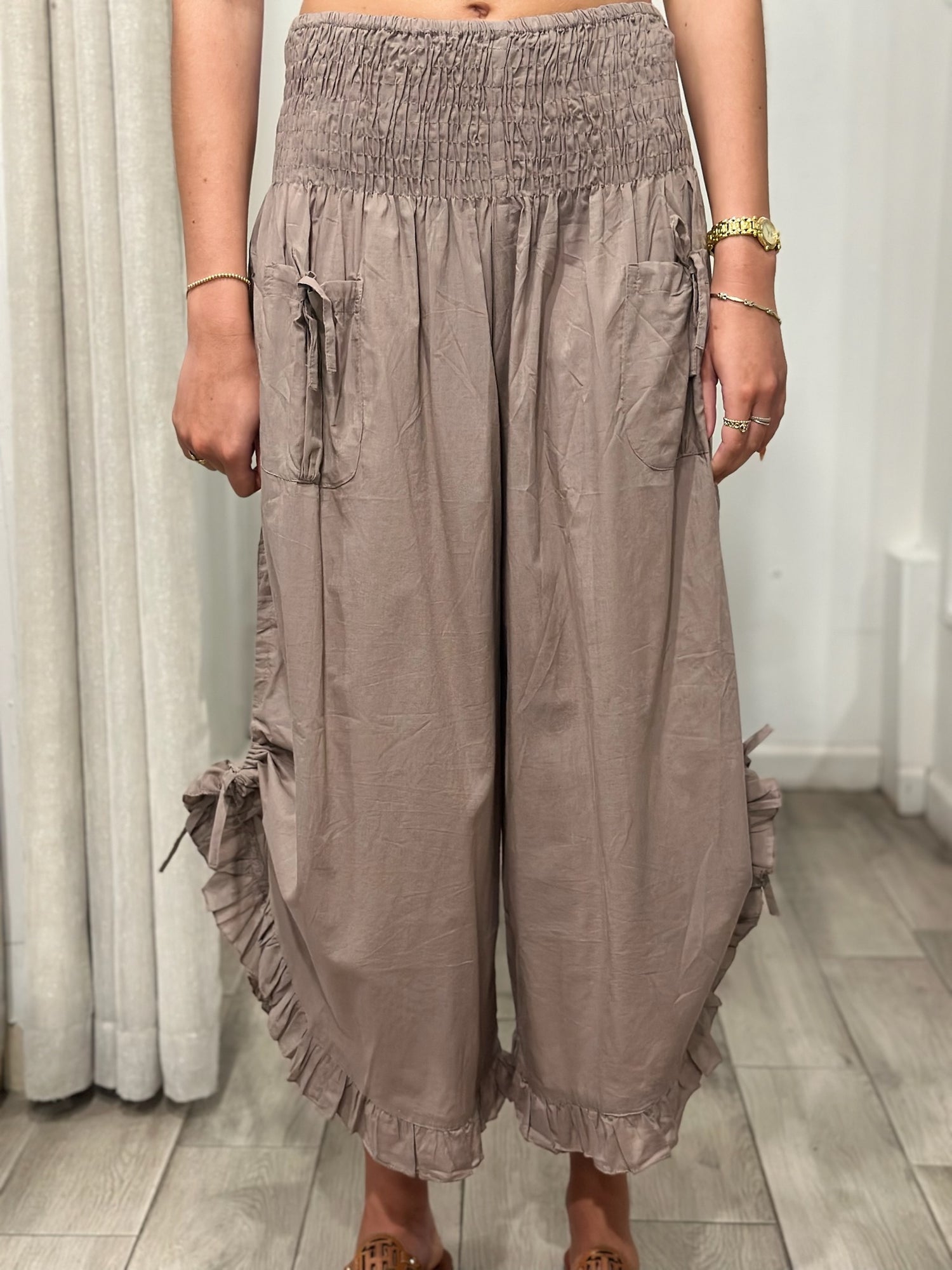 front view of woman wearing one size pants