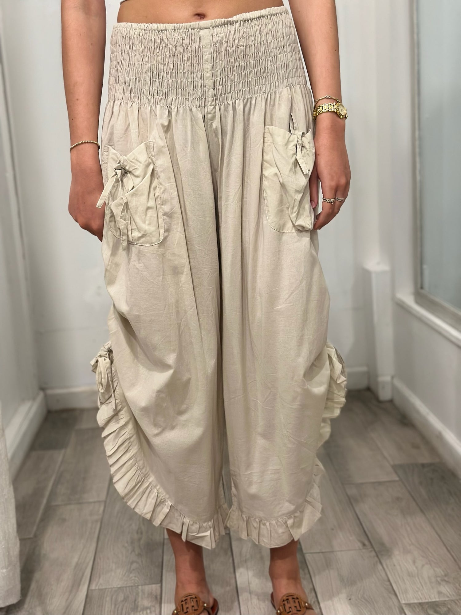front view of woman wearing pants