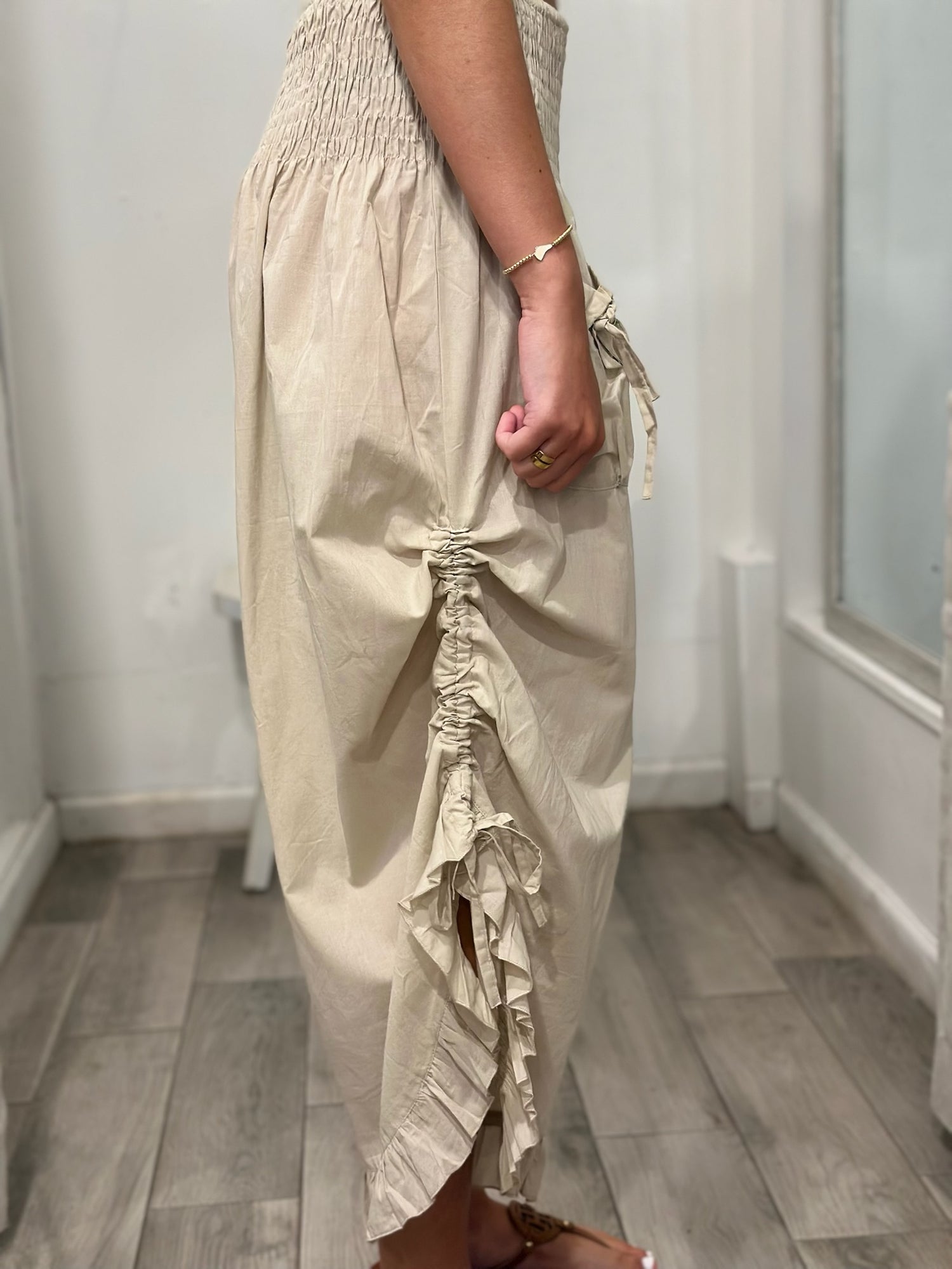 side view of woman wearing pants