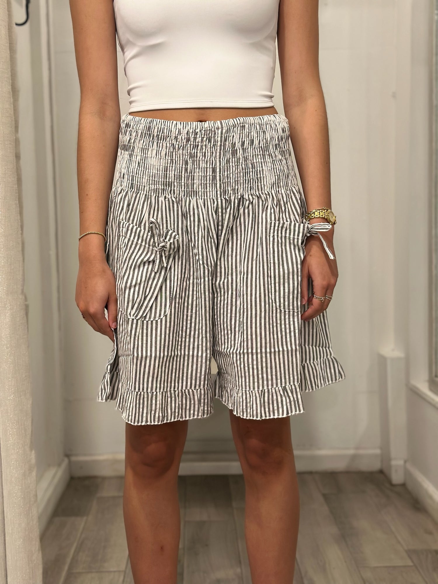 front view of woman in shorts
