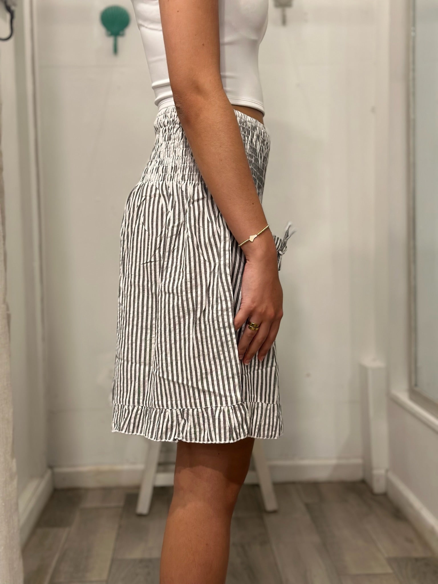 side view of woman in shorts 