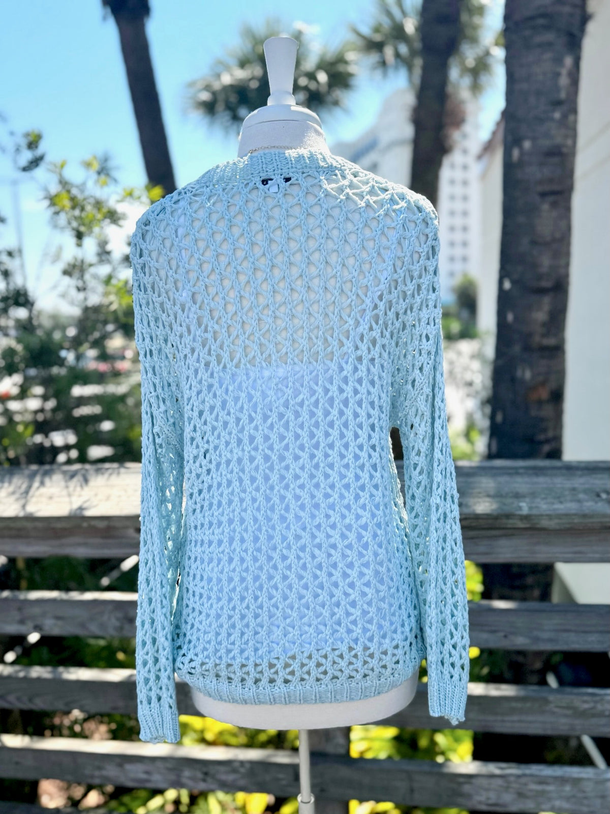 Soft aqua blue open knit sweater with long sleeves and relaxed fit at Ardor Boutique.