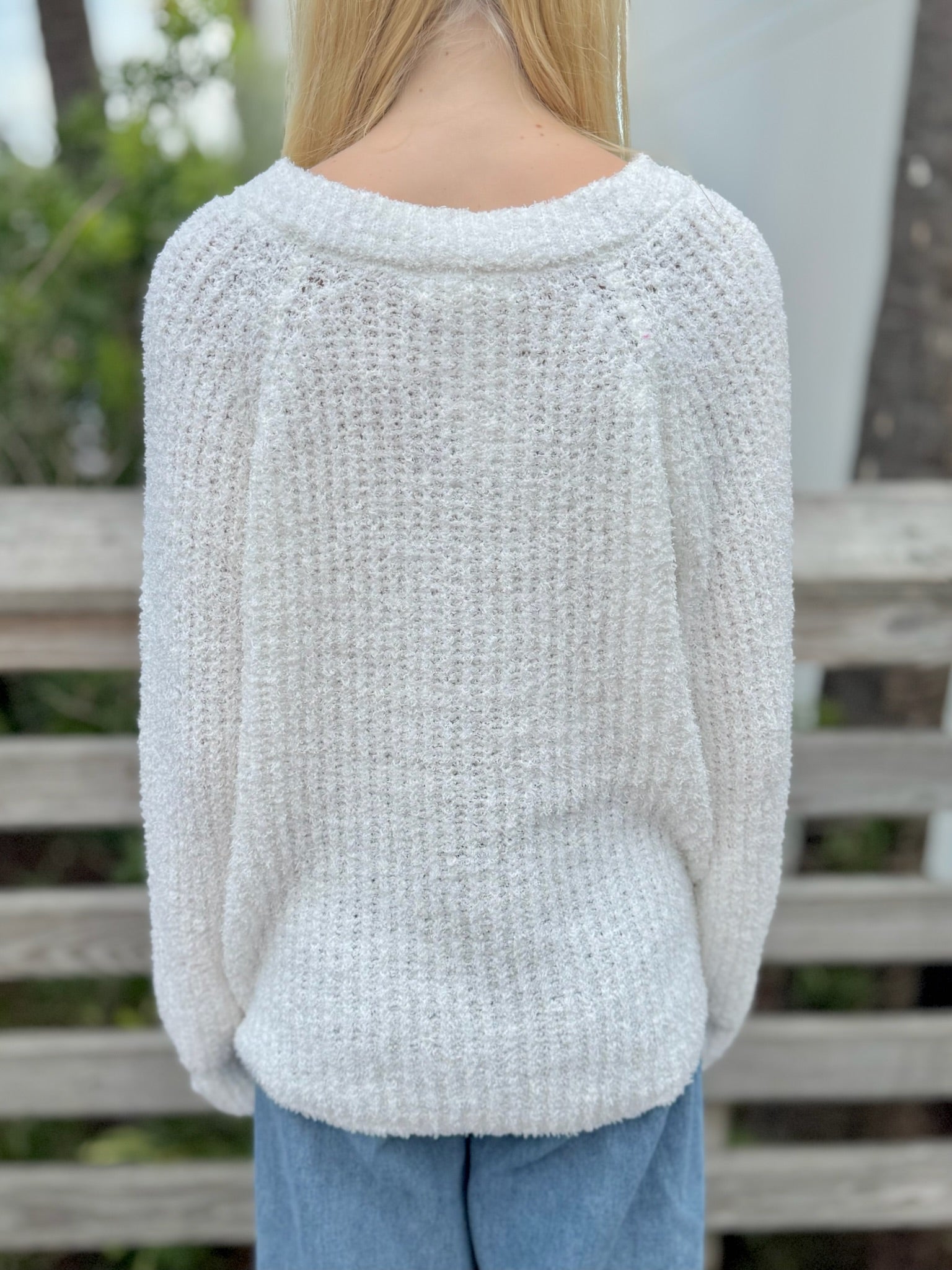 Back of Ella Reversible V neck Sweater 