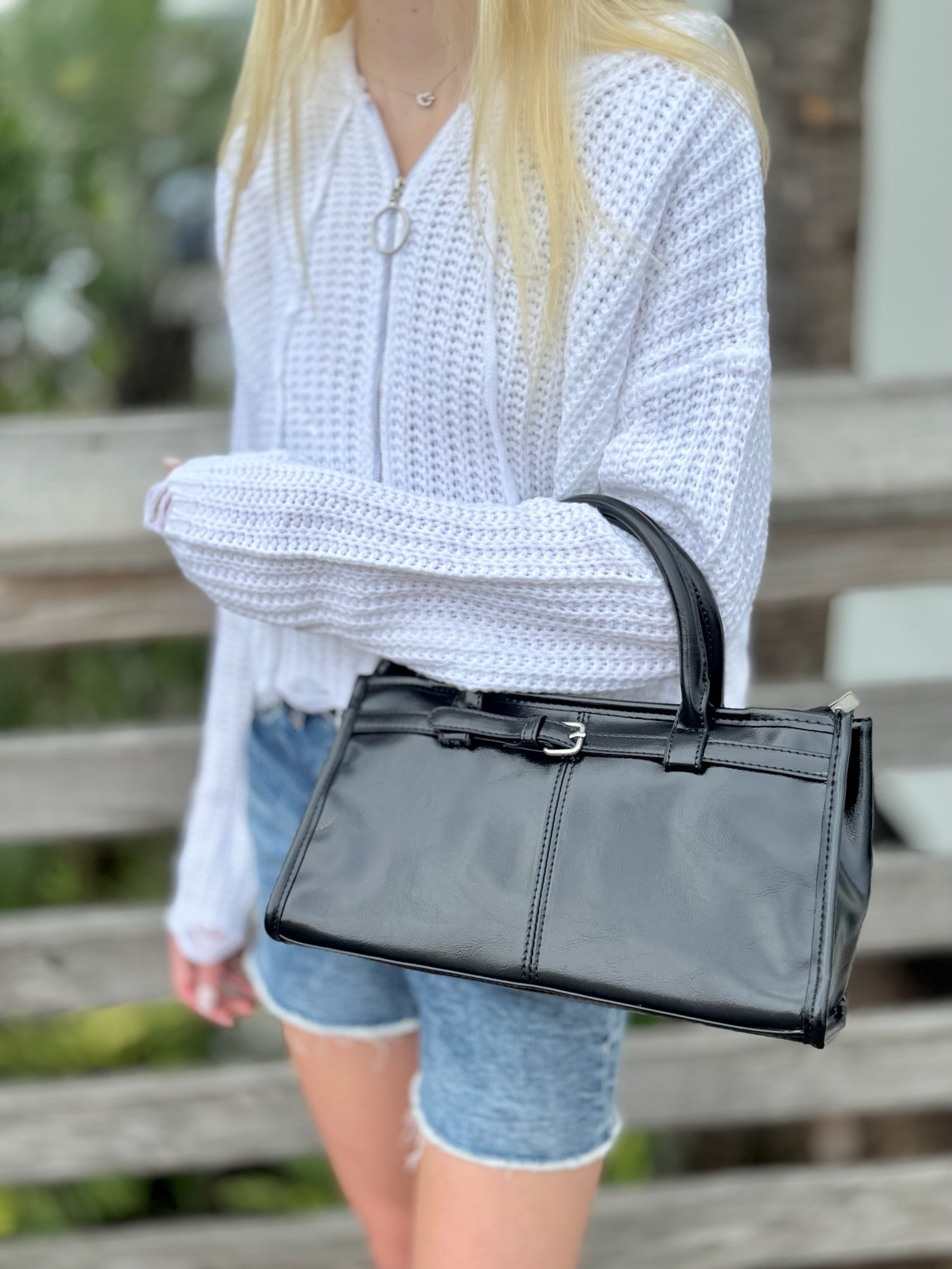 Cecelia crossbody in black being worn