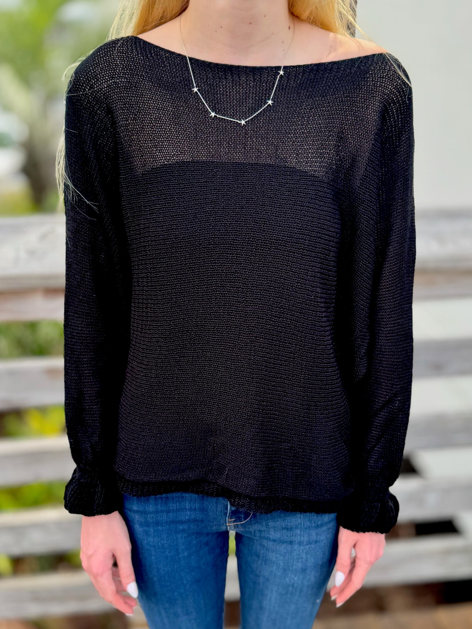Black knit sweater front view