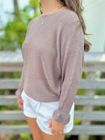 Taupe knit sweater side view