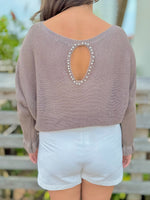 Taupe knit sweater back view
