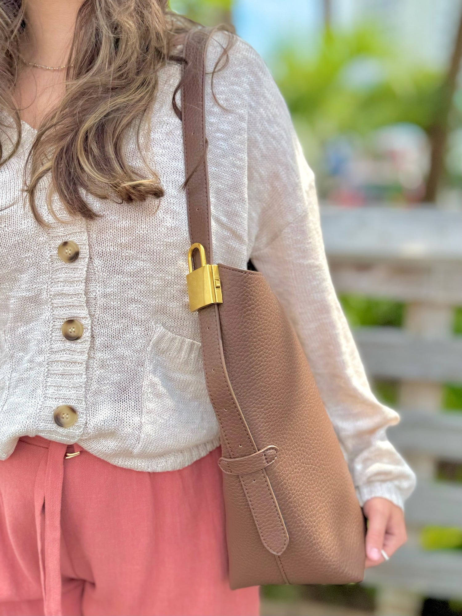 Jade bag in chocolate being worn 