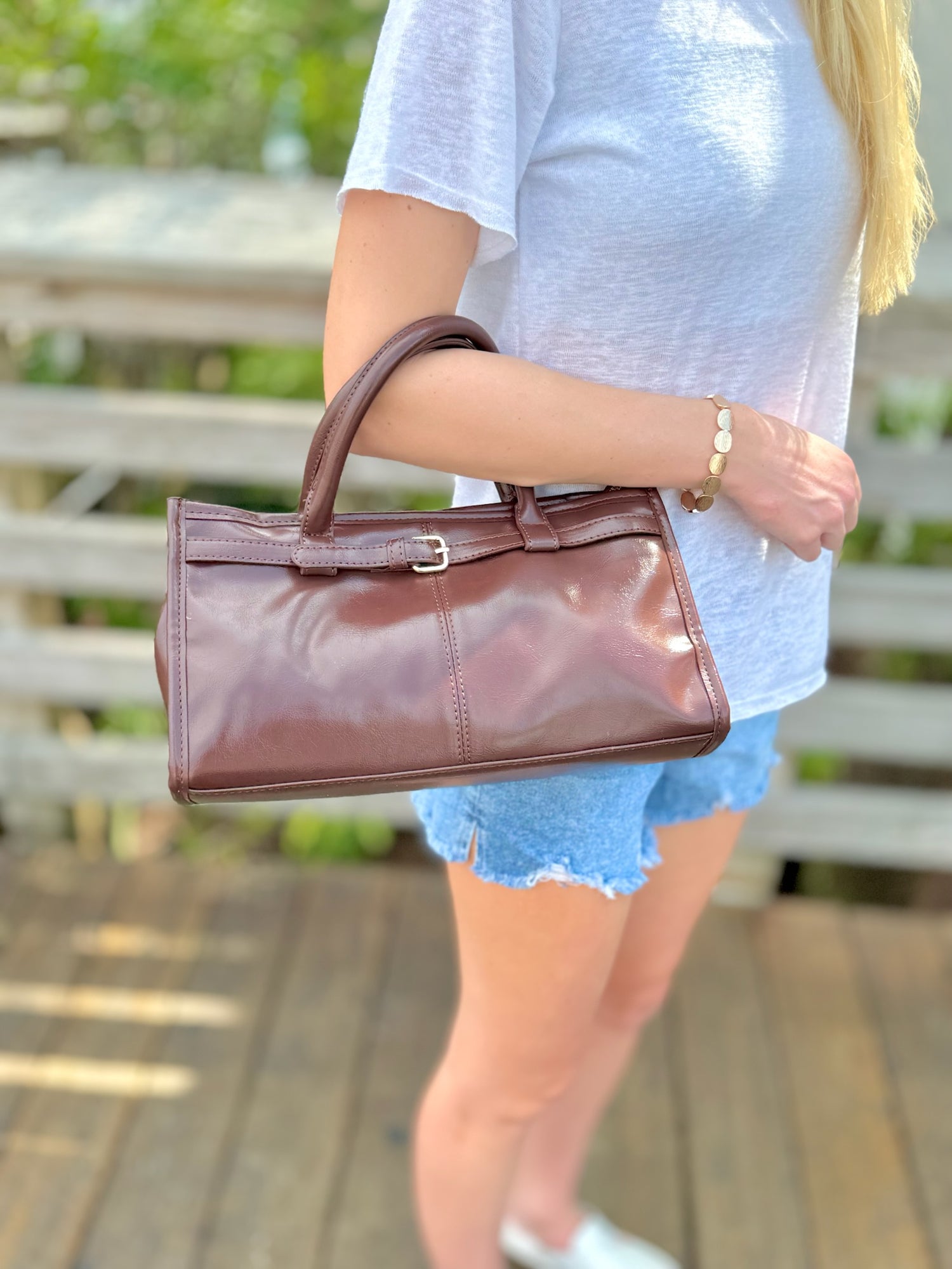 Cecelia crossbody in chocolate being worn